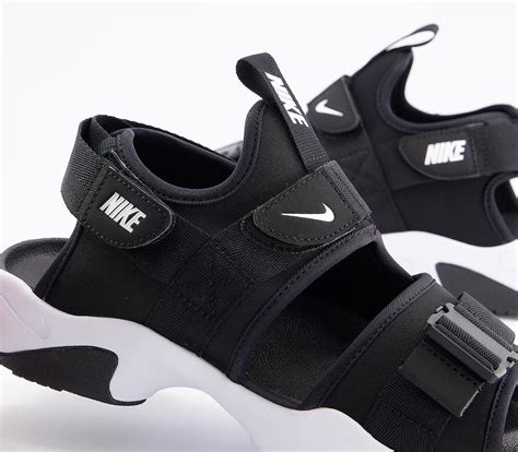 black nike sandals.